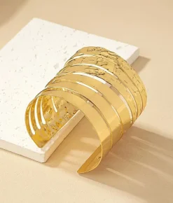 Discount Bosanova Brazalete dorado con aperturas