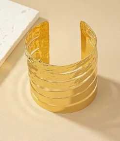 Discount Bosanova Brazalete dorado con aperturas